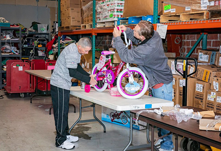 Dream Center's annual Santa's Workshop bike assemblers
